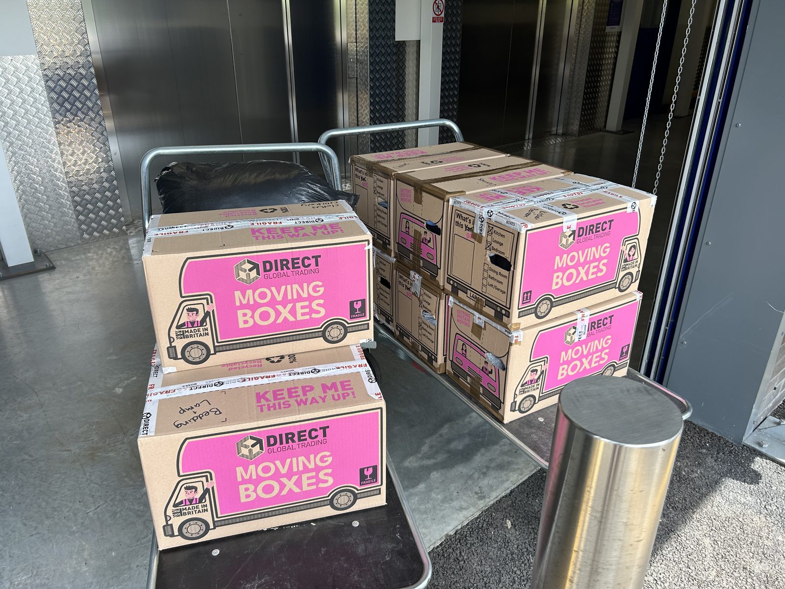 Moving boxes ready for student collection