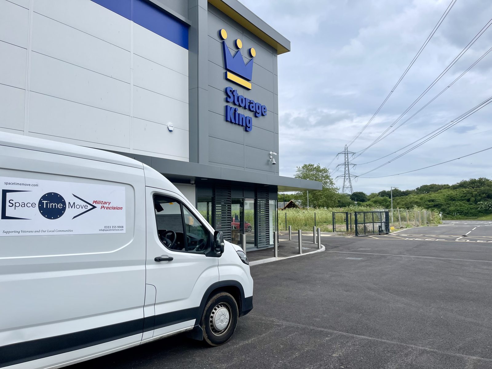 SpaceTime Move van outside Storage King